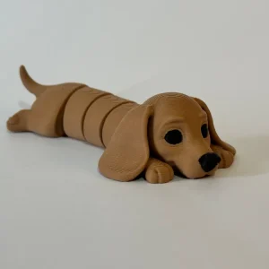 Антистресс игрушка Такса подвижная 3D.